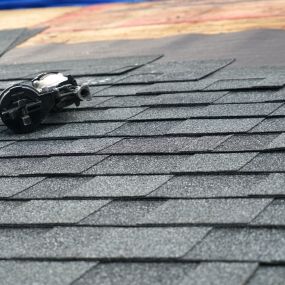 Roof nailer on a partially shingled roof