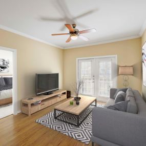 Living room with white crown molding overlooking balcony