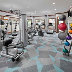 24-Hour Fitness Center with Cardio and Strength Equipment