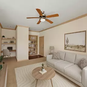 Living room with built-in shelves and desk at Camden Amber Oaks apartments in Austin, TX