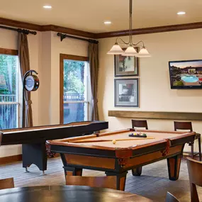 Resident lounge with billiards and shuffleboard