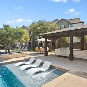 Poolside covered grills at the second pool at Camden Amber Oaks