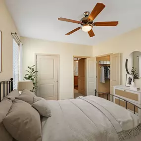 Bedroom with ensuite and walk-in closet at Camden Amber Oaks apartments in Austin, TX