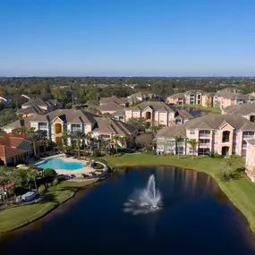 Aerial view of community surrounding onsite lake