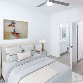 Modern style bedroom with ensuite bath and walk-in closet at Camden Royal Palms apartments in Brandon, FL