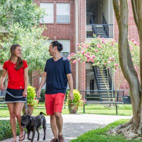 Walking trail and pet stations at Camden Stonebridge Apartments in Houston, TX