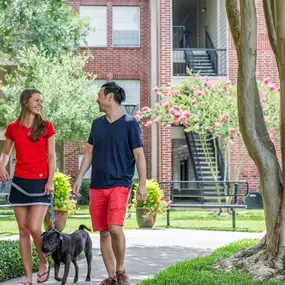 Walking trail and pet stations at Camden Stonebridge Apartments in Houston, TX