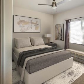 Townhome main bedroom with ceiling fan and ensuite bathroom