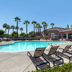 Swimming pool chairs on sundeck