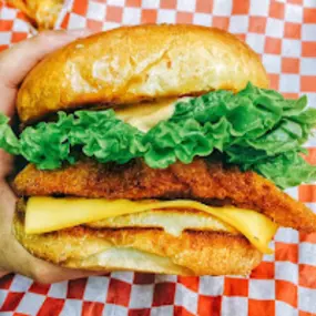 Close up image of a chicken sandwich at Taystee's Burgers