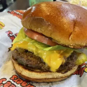 Close up of a cheeseburger at Taystee's in Dearborn