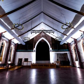 Active DJ Entertainment can enhance your special events overall vibe with Special-Effect Lighting, from uplighting to monogram lighting to patterns of light dancing across the walls. Photo by Matt Ray Photography.