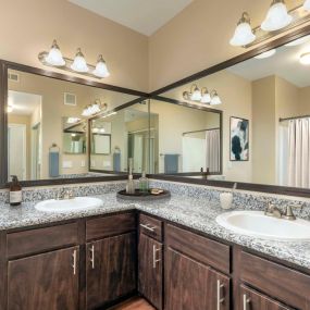 Luxury main bathroom with granite countertops