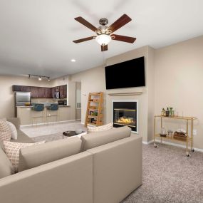 Open-concept living room with patio