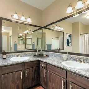 Luxury main bathroom with granite countertops