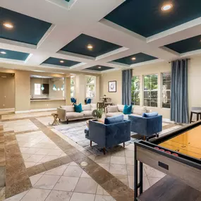 Camden Crown Valley Apartments Mission Viejo CA Clubhouse with Shuffleboard and Seating Areas