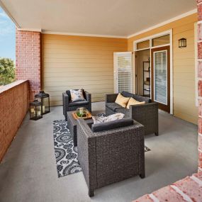 Private patio overlooking community landscaping