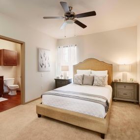 Neighborhood two bedroom with ensuite bath ceiling fan and carpet flooring