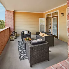 Private patio overlooking community landscaping