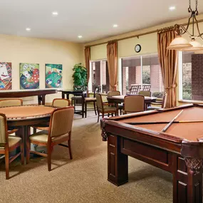 Resident lounge with billiards and shuffleboard