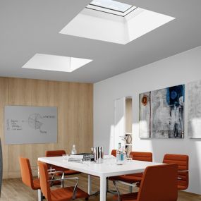 VELUX Commercial fixed skylights by Fasten-Pro Roofing, LLC.