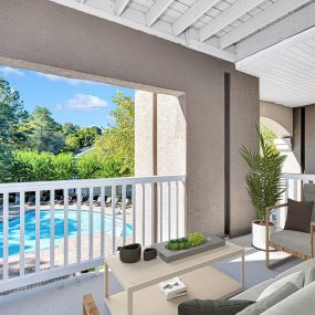 Large balcony overlooking the pool