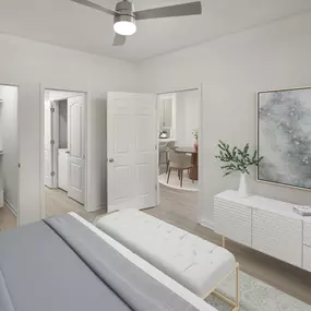 Bedrooms with lighted ceiling fans at Camden Westwood apartments in Morrisville, NC