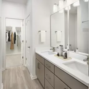 Bathrooms with double sink vanities at Camden Westwood apartments in Morrisville, NC