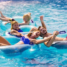 Guests posing in the lazy river