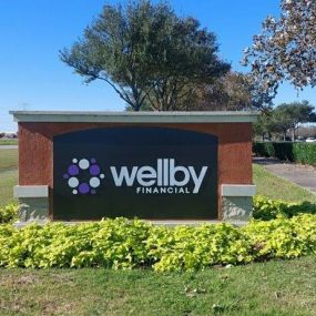Exterior signage of Wellby Financial in League City