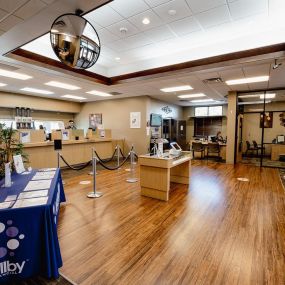 Interior lobby of federal credit union with finance professionals