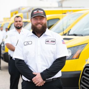 Some of the amazing One Hour team with their fleet of service vehicles ready for any heating and AC repair in the Dallas, TX area.