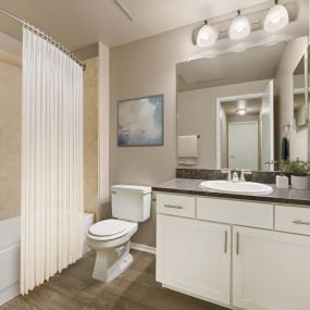 Bathroom with granite countertops  at Camden Denver West Apartments in Golden, CO
