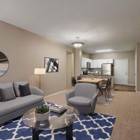 Living room with gas fireplace  at Camden Denver West Apartments in Golden, CO