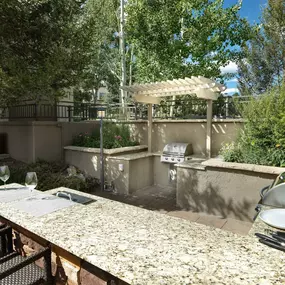 Outdoor kitchen grill  at Camden Denver West Apartments in Golden, CO