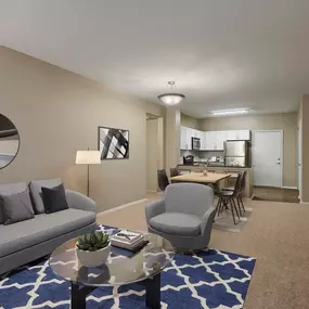 Living room with gas fireplace  at Camden Denver West Apartments in Golden, CO