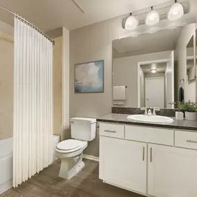 Bathroom with granite countertops  at Camden Denver West Apartments in Golden, CO