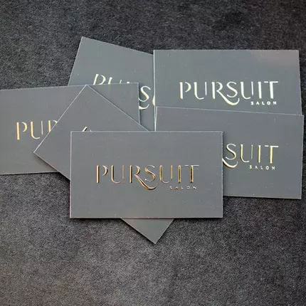 Logótipo de Pursuit Salon