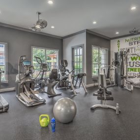 Fitness center with cardio and weight equipment