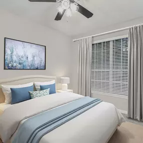 Bedroom with ceiling fan, carpet flooring, and large window for natural light