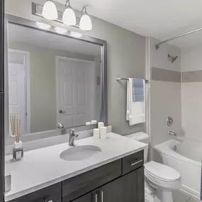 Bathroom with white quartz countertops