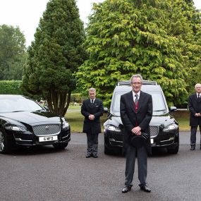 Miles & Daughters Funeral Directors vehicles and staff