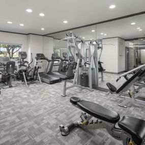 24-Hour Fitness center with cardio and strength equipment