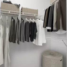 Renovated walk-in closet at Camden Cimarron apartments in Irving, Tx