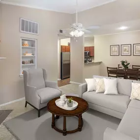 Living room top floor with extended ceilings and ceiling fan