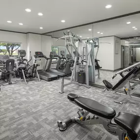 24-Hour Fitness center with cardio and strength equipment