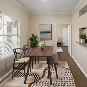 Dining area with wood-style flooring at Camden Cimarron