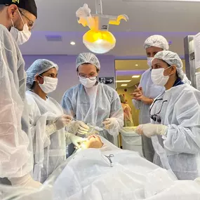 Image of a dentist at My Dentist of Life in Plantation performing an All-on-4 dental implant procedure.