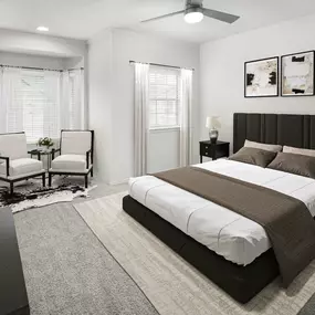 Spacious bedroom with carpet, ceiling fan, and bay windows at Camden Legacy Park apartments in Plano, TX