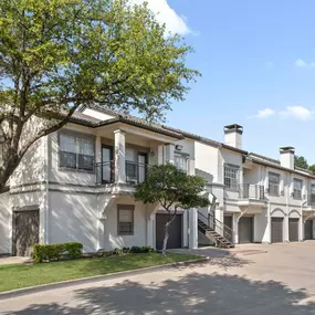 Building exterior showing private garages at Camden Legacy Park